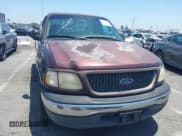 ✅ 2000 Ford F-150 XL • VIN: 1FTRX17L5YKA20771 • Lot: 42519310. Listed on IAAI with Not provided. Free auction sales archive from the USA and detailed vehicle history report at DreamBid. Image 6.