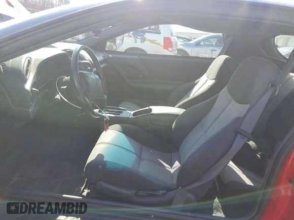 1994 Chevrolet Camaro Z28 z VIN 2G1FP22P1R2174580, wystawiony jako Copart lot #47289165 z przebiegiem 35 711 mil mil oraz Szkoda całkowita • Salvage title. Historia ofert i sprzedaży dostępna na DreamBid. Obrazek 7.