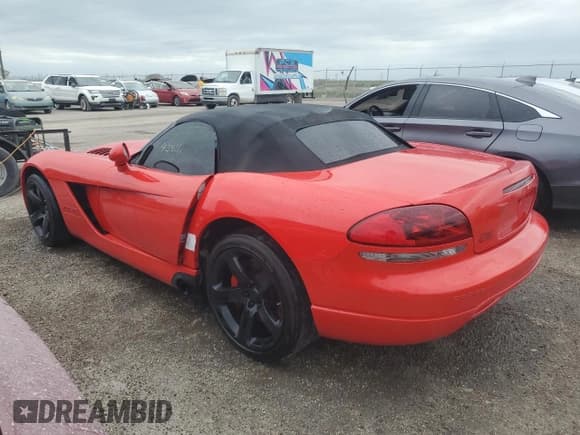 ✅ 2003 Dodge Viper SRT-10 • VIN: 1B3JR65Z73V501755 • Lot: 76250344. Listed on Copart with 43,826 mi. Free auction sales archive from the USA and detailed vehicle history report at DreamBid. Image 2.