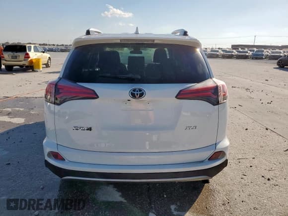 ✅ 2018 Toyota RAV4 XLE • VIN: JTMWFREV0JJ199399 • Lot: 92922985. Listed on Copart with 75,574 mi. Free auction sales archive from the USA and detailed vehicle history report at DreamBid. Image 6.