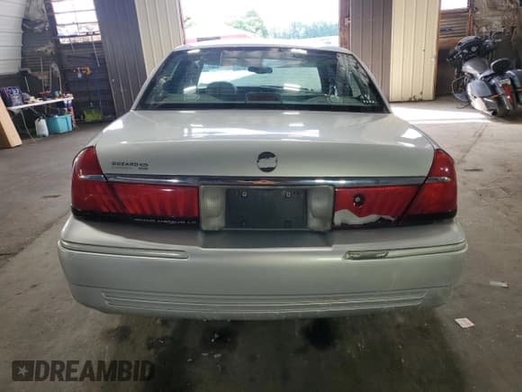 ✅ 2001 Mercury Grand Marquis LS • VIN: 2MEFM75W81X603977 • Лот: 64108865. Опубликован ранее на Copart с пробегом 187 153 миль. Бесплатный доступ к архиву аукционных продаж из США и подробный отчёт об истории автомобиля на DreamBid. Изображение 6.