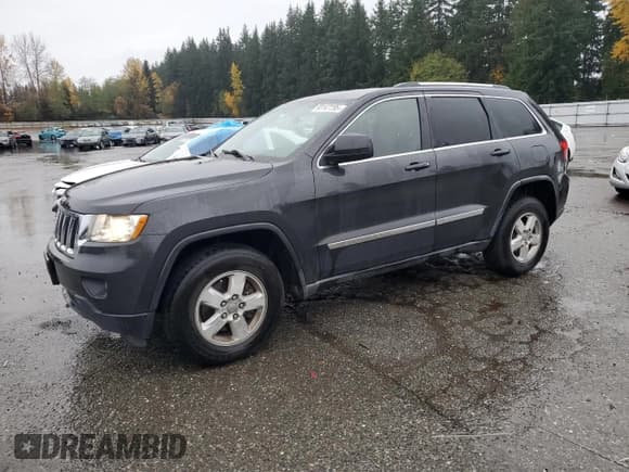 ✅ 2011 Jeep Grand Cherokee Laredo • VIN: 1J4RR4GG9BC705592 • Lot: 93147795. Listed on Copart with 221,481 mi. Free auction sales archive from the USA and detailed vehicle history report at DreamBid. Image 1.
