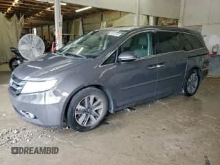 ✅ 2015 Honda Odyssey Touring Elite • VIN: 5FNRL5H98FB103594 • Lot: 94152155. Listed on Copart with 176,146 mi. Free auction sales archive from the USA and detailed vehicle history report at DreamBid. Image 1.