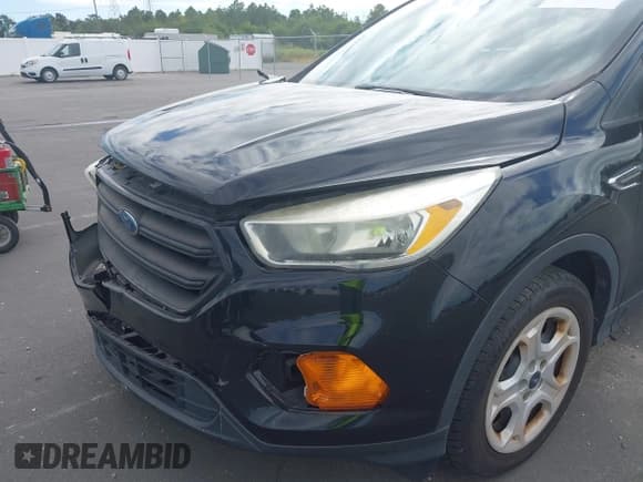 ✅ 2017 Ford Escape S • VIN: 1FMCU0F75HUE64892 • Lot: 43472779. Listed on IAAI with 118,571 mi. Free auction sales archive from the USA and detailed vehicle history report at DreamBid. Image 16.