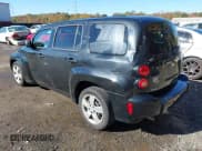 ✅ 2010 Chevrolet HHR LS • VIN: 3GNBAADB2AS513730 • Lot: 43467069. Listed on IAAI with 155,631 mi. Free auction sales archive from the USA and detailed vehicle history report at DreamBid. Image 3.