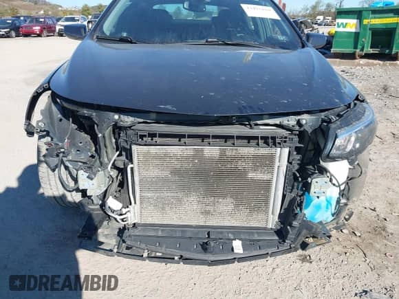 2018 Chevrolet Malibu LT z VIN 1G1ZD5ST0JF244643, wystawiony jako IAAI lot #43475110 z przebiegiem 137 932 mil mil oraz . Historia ofert i sprzedaży dostępna na DreamBid. Obrazek 6.