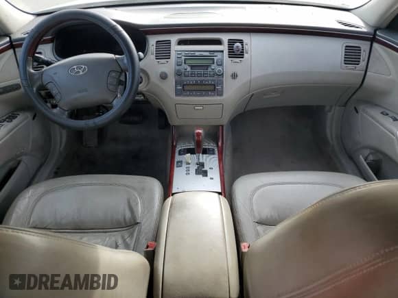 2006 Hyundai Azera SE с VIN KMHFC46F66A128343, выставлен на аукционе Copart как лот 83447424 с пробегом 274 218 миль миль и Списание • Salvage title. История ставок и продаж доступна на DreamBid. Изображение 8.