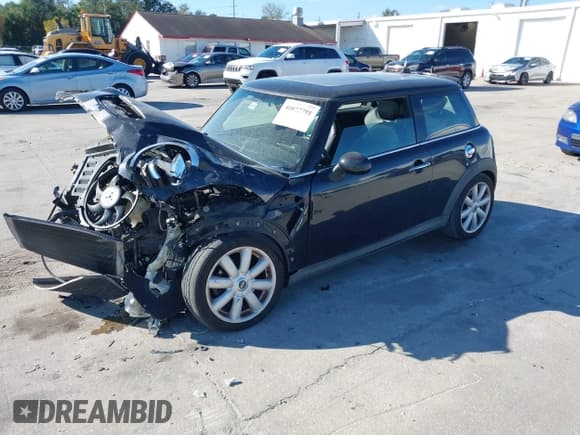 ✅ 2007 MINI Hardtop S • VIN: WMWMF73517TL88457 • Lot: 40872791. Listed on IAAI with 105,409 mi. Free auction sales archive from the USA and detailed vehicle history report at DreamBid. Image 2.