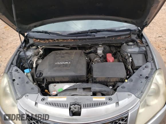 ✅ 2012 Suzuki Kizashi SE • VIN: JS2RE9A31C6101190 • Лот: 73465354. Опубликован ранее на Copart с пробегом 154 466 миль. Бесплатный доступ к архиву аукционных продаж из США и подробный отчёт об истории автомобиля на DreamBid. Изображение 11.