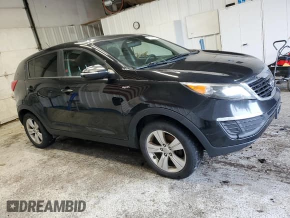 ✅ 2012 Kia Sportage LX • VIN: KNDPBCA22C7310415 • Лот: 61541825. Опубликован ранее на Copart с пробегом 176 301 миль. Бесплатный доступ к архиву аукционных продаж из США и подробный отчёт об истории автомобиля на DreamBid. Изображение 4.