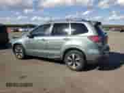 2017 Subaru Forester Limited with VIN JF2SJARC0HH523882, listed as a Copart auction lot 82651095 with 65,088 mi miles and Salvage title. Bid and sale history available at DreamBid. Image 2.