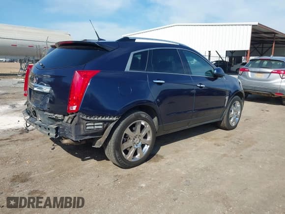 ✅ 2011 Cadillac SRX Performance Collection • VIN: 3GYFNBEY9BS541026 • Lot: 43523890. Wystawiony na IAAI z przebiegiem 78 432 mil. Bezpłatny archiwum sprzedaży aukcyjnych z USA i szczegółowy raport historii pojazdu na DreamBid. Zdjęcie 4.