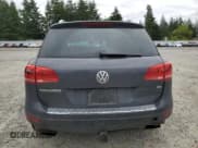 ✅ 2013 Volkswagen Touareg Lux • VIN: WVGEF9BP0DD001551 • Lot: 59818225. Listed on Copart with 171,653 mi. Free auction sales archive from the USA and detailed vehicle history report at DreamBid. Image 6.