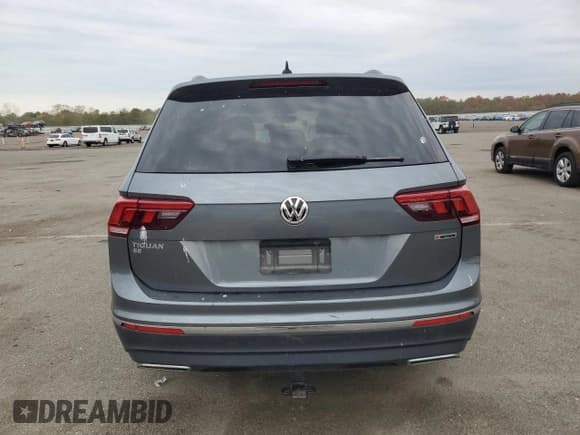 ✅ 2021 Volkswagen Tiguan SE • VIN: 3VV2B7AX8MM020332 • Lot: 91028245. Wystawiony na Copart z przebiegiem 65 748 mil. Bezpłatny archiwum sprzedaży aukcyjnych z USA i szczegółowy raport historii pojazdu na DreamBid. Zdjęcie 6.