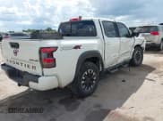 ✅ 2023 Nissan Frontier SV • VIN: 1N6ED1EK4PN629149 • Lot: 43280024. Listed on IAAI with 60,390 mi. Free auction sales archive from the USA and detailed vehicle history report at DreamBid. Image 4.