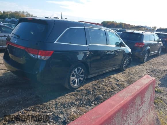 ✅ 2014 Honda Odyssey Touring • VIN: 5FNRL5H91EB133860 • Lot: 43515152. Wystawiony na IAAI z przebiegiem 101 698 mil. Bezpłatny archiwum sprzedaży aukcyjnych z USA i szczegółowy raport historii pojazdu na DreamBid. Zdjęcie 4.