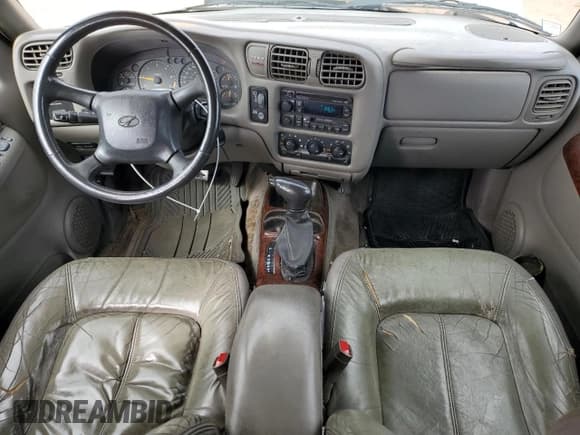 ✅ 1999 Oldsmobile Bravada • VIN: 1GHDT13W7X2720659 • Lot: 85552105. Wystawiony na Copart z przebiegiem 206 014 mil. Bezpłatny archiwum sprzedaży aukcyjnych z USA i szczegółowy raport historii pojazdu na DreamBid. Zdjęcie 8.