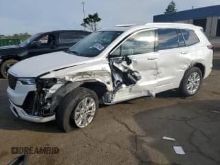 ✅ 2025 Cadillac XT6 AWD Luxury • VIN: 1GYKPBR42SZ140307 • Лот: 80215455. Опубликован ранее на Copart с пробегом 2 674 миль. Бесплатный доступ к архиву аукционных продаж из США и подробный отчёт об истории автомобиля на DreamBid. Изображение 1.