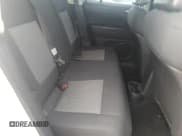 ✅ 2009 Jeep Patriot Sport • VIN: 1J4FT28B29D211364 • Lot: 84202845. Listed on Copart with 114,731 mi. Free auction sales archive from the USA and detailed vehicle history report at DreamBid. Image 11.