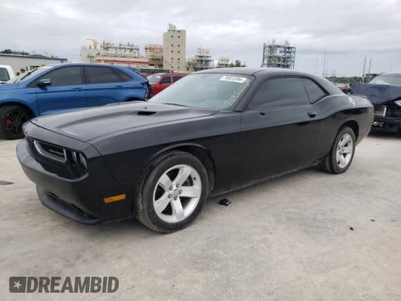 2012 Dodge Challenger SXT with VIN 2C3CDYAG7CH124959, listed as a Copart auction lot 70822264 with 184,413 mi miles and Clean title. Bid and sale history available at DreamBid. Image 1.