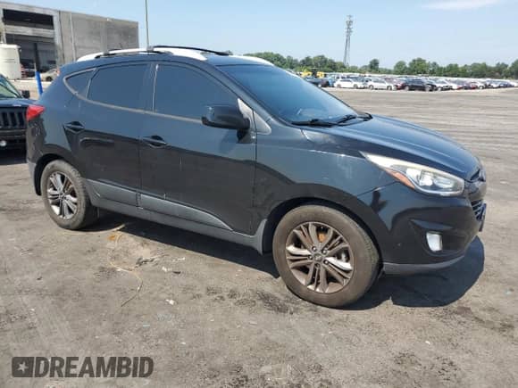 2015 Hyundai Tucson SE with VIN KM8JUCAG1FU101650, listed as a Copart auction lot 61664723 with 76,957 mi miles and . Bid and sale history available at DreamBid. Image 4.