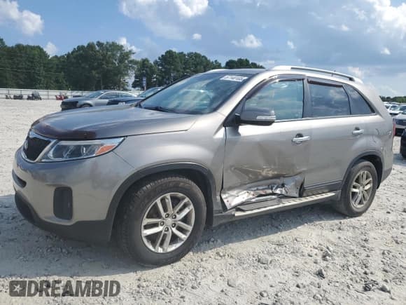 ✅ 2014 Kia Sorento LX • VIN: 5XYKT4A79EG480401 • Lot: 67140105. Listed on Copart with 102,152 mi. Free auction sales archive from the USA and detailed vehicle history report at DreamBid. Image 1.