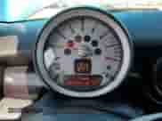 2010 MINI Hardtop S with VIN WMWMF7C58ATX42725, listed as a Copart auction lot 59818915 with 86,452 mi miles and Salvage title. Bid and sale history available at DreamBid. Image 9.