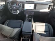 ✅ 2025 Ford Bronco Outer Banks • VIN: 1FMEE8BP9SLA75924 • Lot: 71235225. Listed on Copart with 3,574 mi. Free auction sales archive from the USA and detailed vehicle history report at DreamBid. Image 8.