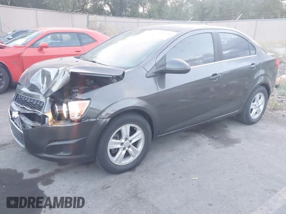 ✅ 2014 Chevrolet Sonic LT • VIN: 1G1JC5SH7E4167993 • Lot: 43055510. Listed on IAAI with 115,256 mi. Free auction sales archive from the USA and detailed vehicle history report at DreamBid. Image 2.