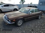 ✅ 1984 Jaguar XJ • VIN: SAJAV1348EC378486 • Лот: 71057415. Опубликован ранее на Copart с пробегом 129 417 миль. Бесплатный доступ к архиву аукционных продаж из США и подробный отчёт об истории автомобиля на DreamBid. Изображение 1.