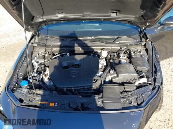 ✅ 2023 Mazda 3 S Select • VIN: 3MZBPABM0PM374140 • Lot: 43705599. Wystawiony na IAAI z przebiegiem 6 578 mil. Bezpłatny archiwum sprzedaży aukcyjnych z USA i szczegółowy raport historii pojazdu na DreamBid. Zdjęcie 10.