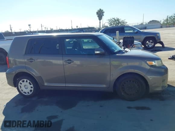 ✅ 2012 Scion xB • VIN: JTLZE4FE6C1143797 • Lot: 43534455. Listed on IAAI with 155,000 mi. Free auction sales archive from the USA and detailed vehicle history report at DreamBid. Image 13.