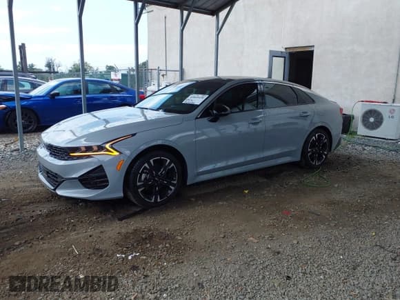 ✅ 2023 Kia K5 GT-Line • VIN: 5XXG64J27PG211919 • Lot: 42845438. Wystawiony na IAAI z przebiegiem 14 475 mil. Bezpłatny archiwum sprzedaży aukcyjnych z USA i szczegółowy raport historii pojazdu na DreamBid. Zdjęcie 2.