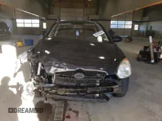 2009 Hyundai Accent Auto GS z VIN KMHCM36C89U106198, wystawiony jako Copart lot #82105534 z przebiegiem 141 788 mil mil oraz Szkoda całkowita • Salvage title. Historia ofert i sprzedaży dostępna na DreamBid. Obrazek 5.