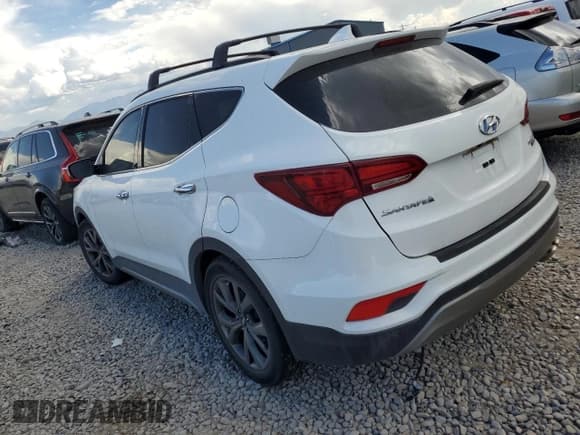 ✅ 2017 Hyundai Santa Fe Ultimate • VIN: 5XYZWDLA9HG492017 • Лот: 68875323. Опубликован ранее на Copart с пробегом Не указан. Бесплатный доступ к архиву аукционных продаж из США и подробный отчёт об истории автомобиля на DreamBid. Изображение 2.