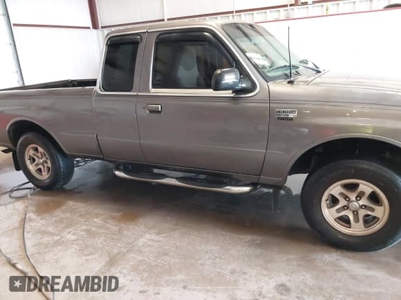 ✅ 2000 Mazda B-Series SE • VIN: 4F4YR16V8YTM09723 • Lot: 41365401. Listed on IAAI with 170,351 mi. Free auction sales archive from the USA and detailed vehicle history report at DreamBid. Image 13.