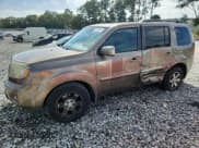 ✅ 2010 Honda Pilot Touring • VIN: 5FNYF4H98AB039661 • Lot: 85287425. Wystawiony na Copart z przebiegiem 234 478 mil. Bezpłatny archiwum sprzedaży aukcyjnych z USA i szczegółowy raport historii pojazdu na DreamBid. Zdjęcie 1.