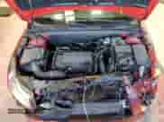 2014 Chevrolet Cruze 1LT z VIN 1G1PC5SB0E7301330, wystawiony jako Copart lot #89848315 z przebiegiem 33 098 mil mil oraz Szkoda całkowita • Salvage title. Historia ofert i sprzedaży dostępna na DreamBid. Obrazek 11.