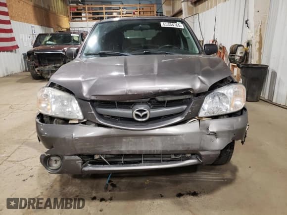 ✅ 2003 Mazda Tribute LX • VIN: 4F2YZ94173KM45019 • Lot: 65334765. Listed on Copart with 182,926 mi. Free auction sales archive from the USA and detailed vehicle history report at DreamBid. Image 5.