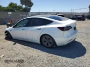 ✅ 2021 Tesla Model 3 Standard Range Plus • VIN: 5YJ3E1EA6MF098061 • Лот: 66001875. Опубликован ранее на Copart с пробегом 70 244 миль. Бесплатный доступ к архиву аукционных продаж из США и подробный отчёт об истории автомобиля на DreamBid. Изображение 2.
