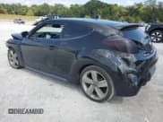 ✅ 2013 Hyundai Veloster Turbo • VIN: KMHTC6AE1DU143762 • Lot: 71797174. Wystawiony na Copart z przebiegiem 162 405 mil. Bezpłatny archiwum sprzedaży aukcyjnych z USA i szczegółowy raport historii pojazdu na DreamBid. Zdjęcie 2.