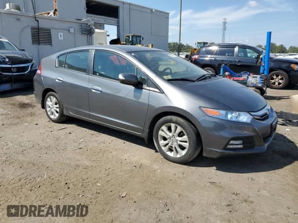 ✅ 2012 Honda Insight EX • VIN: JHMZE2H72CS004788 • Лот: 80522175. Опубликован ранее на Copart с пробегом 138 552 миль. Бесплатный доступ к архиву аукционных продаж из США и подробный отчёт об истории автомобиля на DreamBid. Изображение 4.