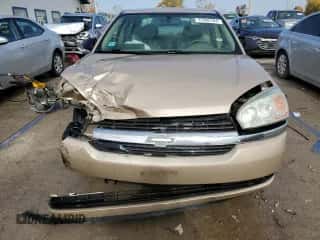 2005 Chevrolet Malibu LS z VIN 1G1ZT54825F274812, wystawiony jako Copart lot #77692784 z przebiegiem 138 306 mil mil oraz Szkoda całkowita • Salvage title. Historia ofert i sprzedaży dostępna na DreamBid. Obrazek 5.