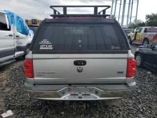 2006 Dodge Dakota SLT с VIN 1D7HW48N36S522858, выставлен на аукционе Copart как лот 66431064 с пробегом 197 028 миль миль и Списание • Salvage title. История ставок и продаж доступна на DreamBid. Изображение 6.