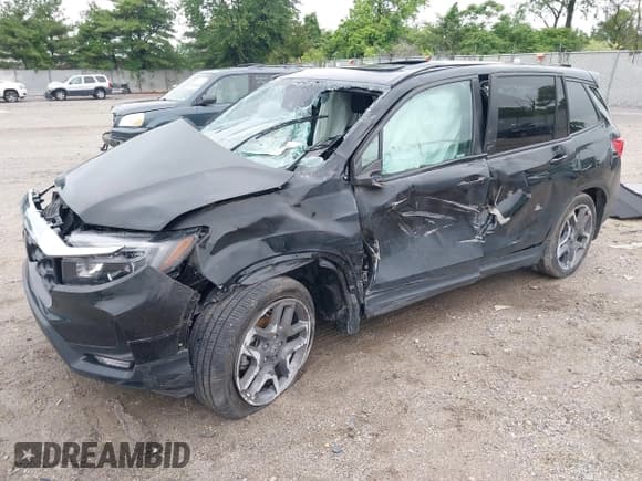 ✅ 2022 Honda Passport EX-L • VIN: 5FNYF7H53NB003316 • Lot: 42376933. Listed on IAAI with 24,842 mi. Free auction sales archive from the USA and detailed vehicle history report at DreamBid. Image 2.