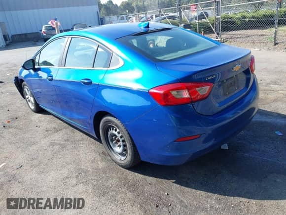 2016 Chevrolet Cruze LT z VIN 1G1BE5SM3G7251421, wystawiony jako IAAI lot #43294353 z przebiegiem 124 676 mil mil oraz . Historia ofert i sprzedaży dostępna na DreamBid. Obrazek 3.