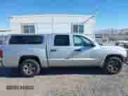 2006 Dodge Dakota SLT with VIN 1D7HE48N46S556925, listed as a IAAI auction lot 41169757 with 158,667 mi miles and . Bid and sale history available at DreamBid. Image 13.