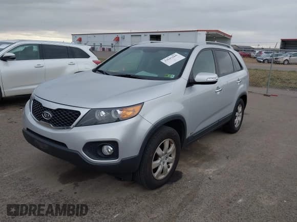 ✅ 2012 Kia Sorento LX • VIN: 5XYKTCA69CG202418 • Lot: 43647666. Listed on IAAI with 158,953 mi. Free auction sales archive from the USA and detailed vehicle history report at DreamBid. Image 2.