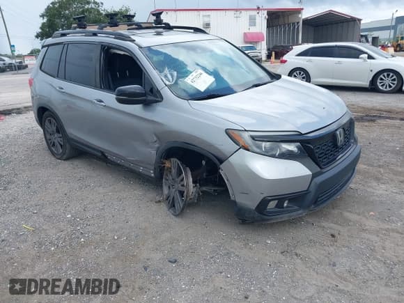 ✅ 2019 Honda Passport EX-L • VIN: 5FNYF7H58KB008121 • Lot: 42732246. Listed on IAAI with 100,859 mi. Free auction sales archive from the USA and detailed vehicle history report at DreamBid. Image 1.