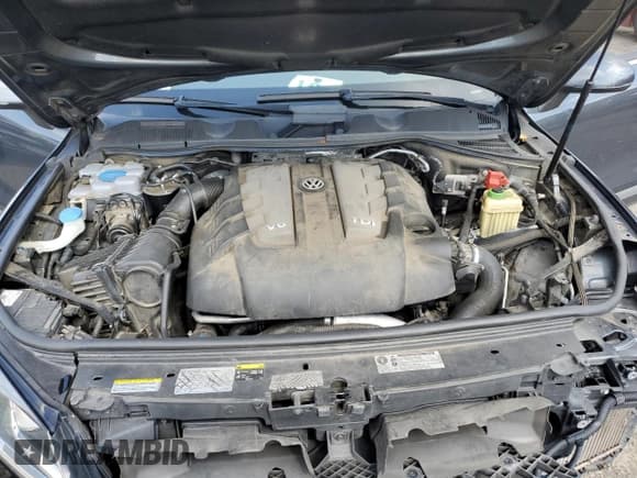 ✅ 2016 Volkswagen Touareg Sport • VIN: WVGEP9BP9GD005227 • Lot: 63731035. Listed on Copart with Not provided. Free auction sales archive from the USA and detailed vehicle history report at DreamBid. Image 12.